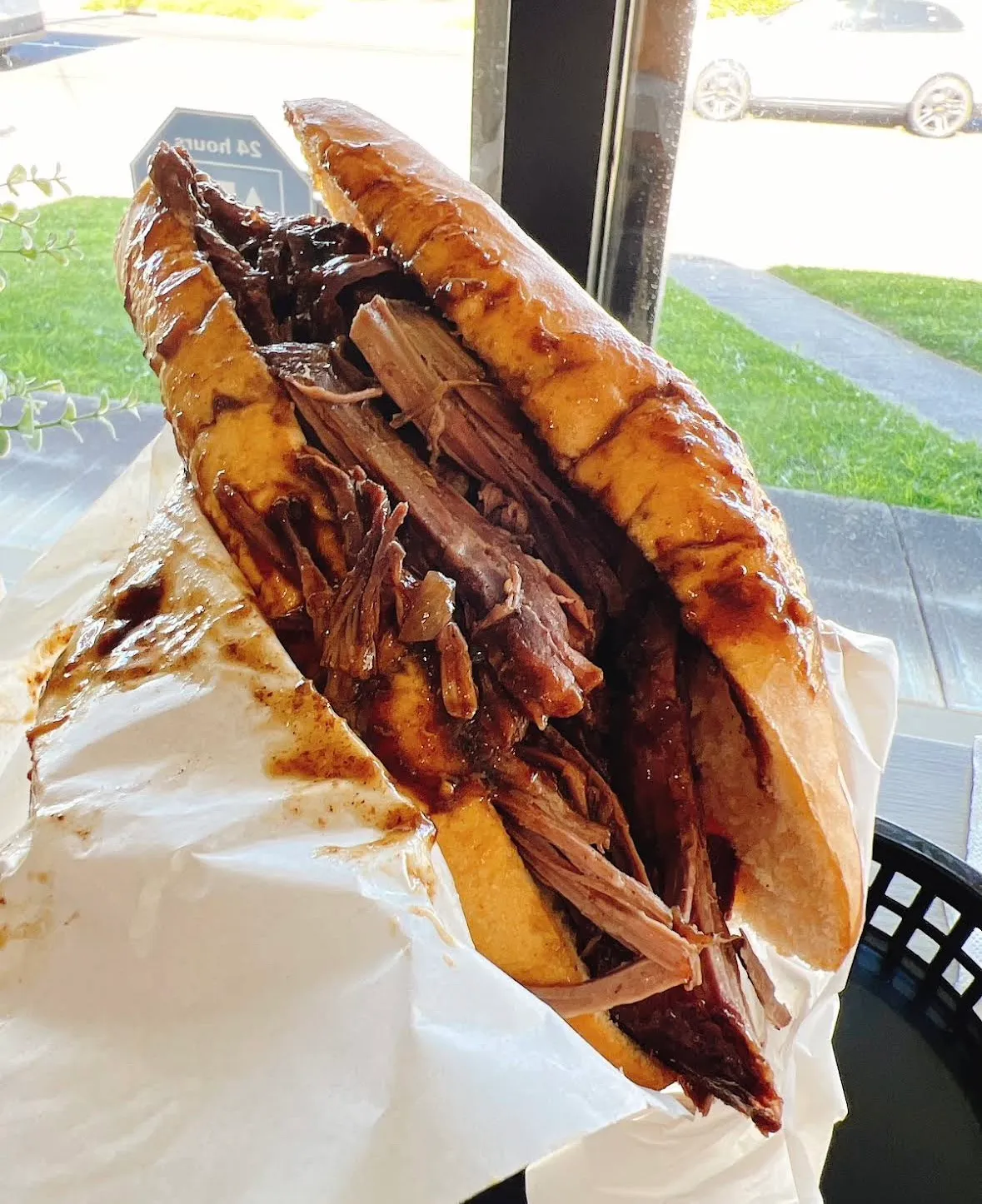 Slow-cooked roast beef roll dripping with gravy