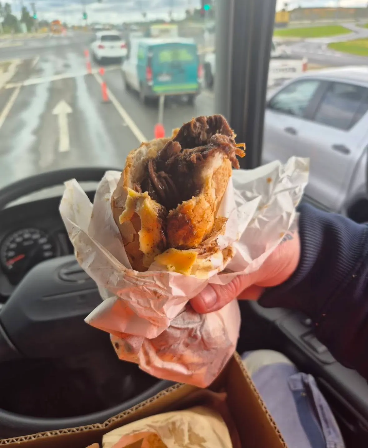 Roast roll with cheese eaten on the go