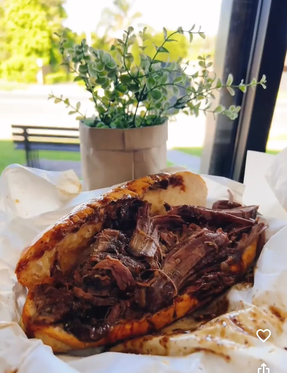 Shredded roast beef roll by the window